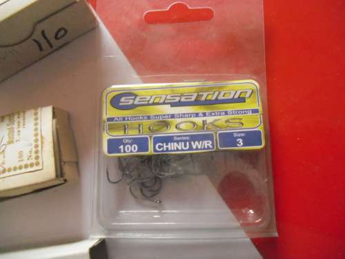 APPROXIMATELY 1500 SMALL MUSTAD AND TRIDENT FISHING HOOKS (NEVER BEEN USED)